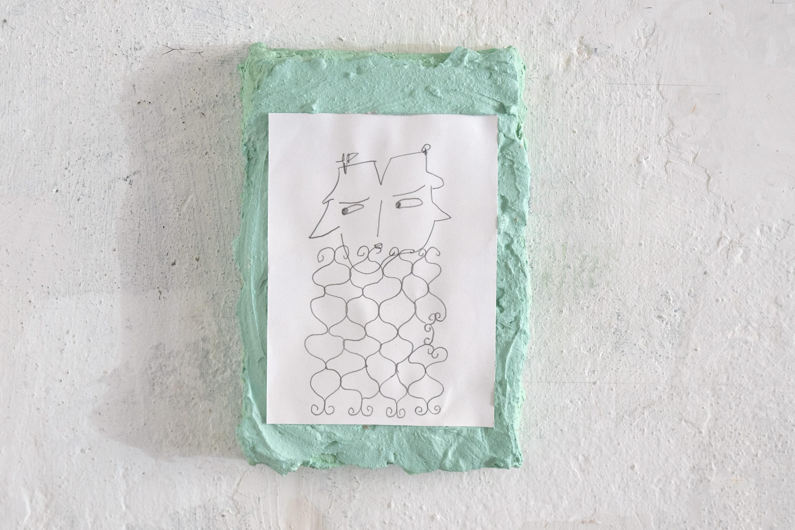 Contemporary mixed media artwork by Munich-based artist, featuring minimalist line drawing of a face and abstract organic forms on textured green background.
